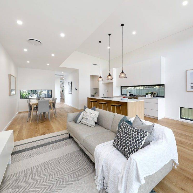 Spacious Kitchen with Island and Pendant Lights